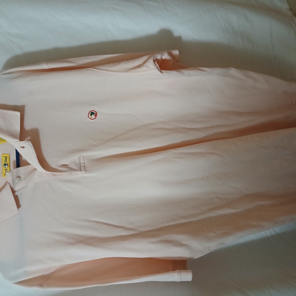 Soft Pink Polo Shirt with Classic Collar and Short Sleeves